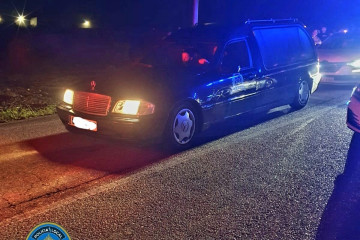 Coche fúnebre en la carrera de O Porriño.